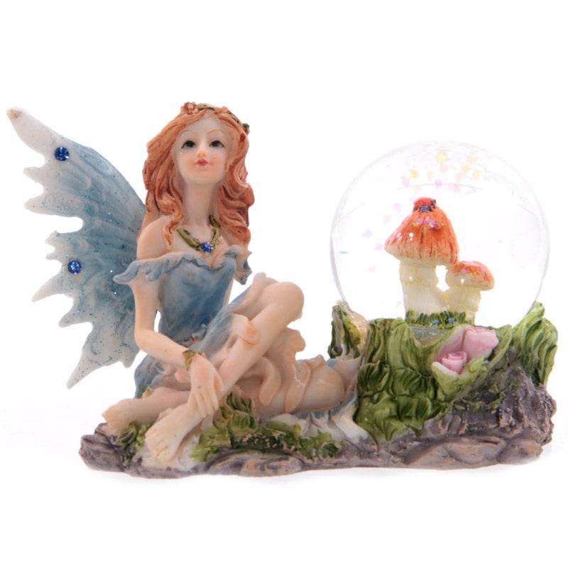 Flower Fairy Sitting Snow Globe - Gift Arch