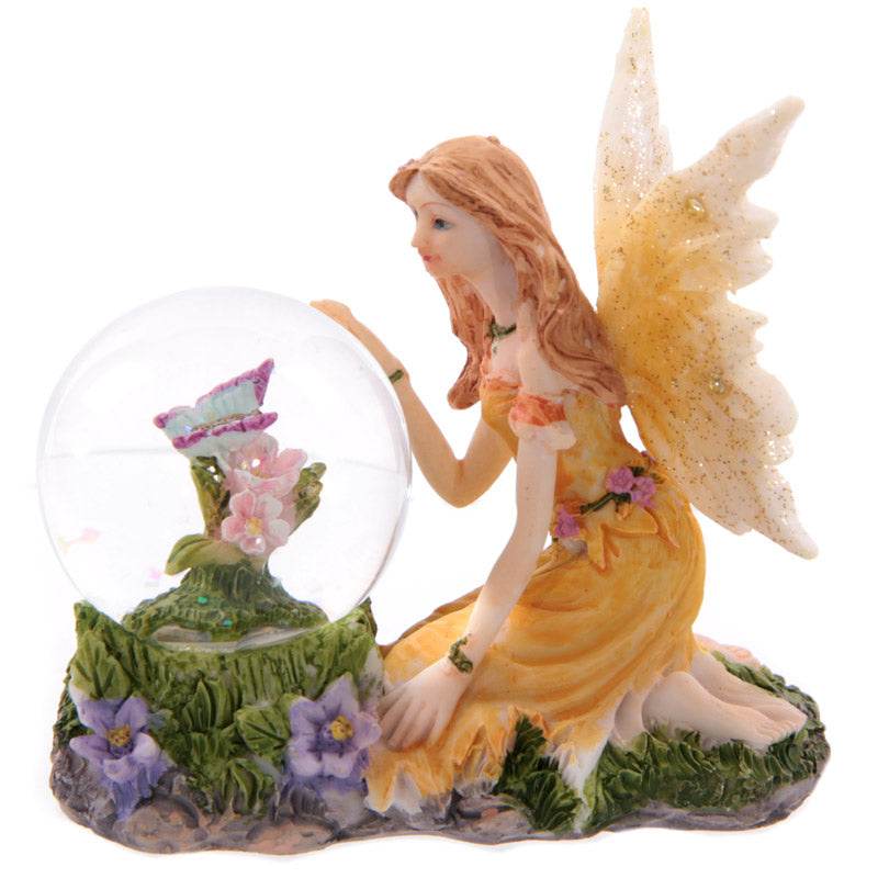 Flower Fairy Sitting Snow Globe - Gift Arch
