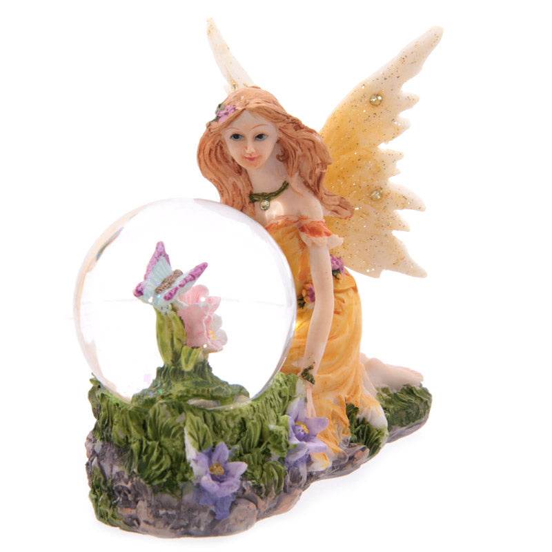 Flower Fairy Sitting Snow Globe - Gift Arch