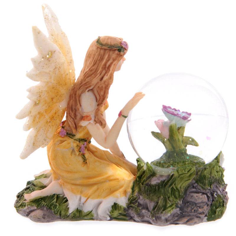 Flower Fairy Sitting Snow Globe - Gift Arch