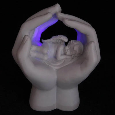 Sleeping Cherub in Hands with LED - Angels & Cherubs
