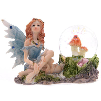 Flower Fairy Sitting Snow Globe - Gift Arch